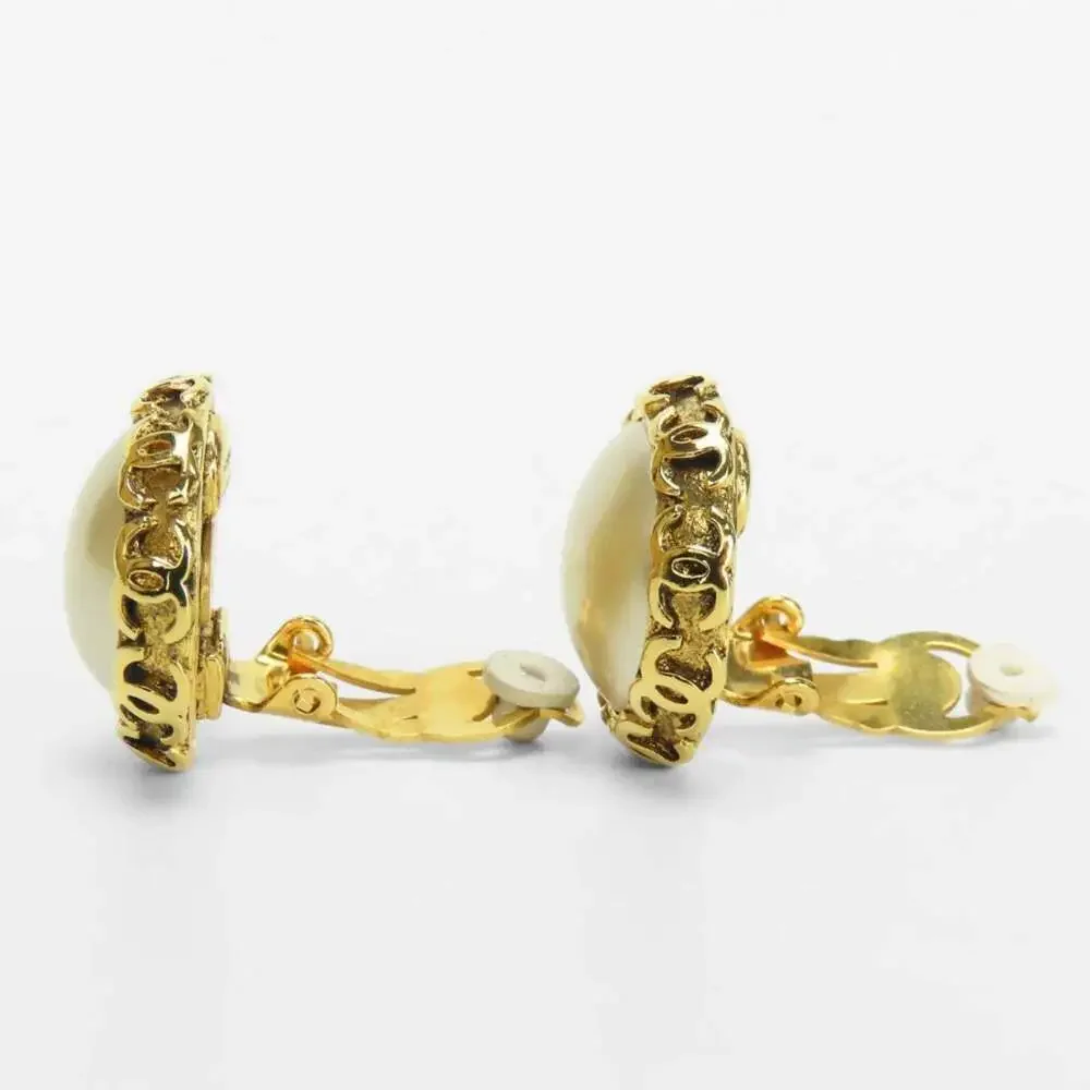 CHANEL Gold Pearl Logo Earrings